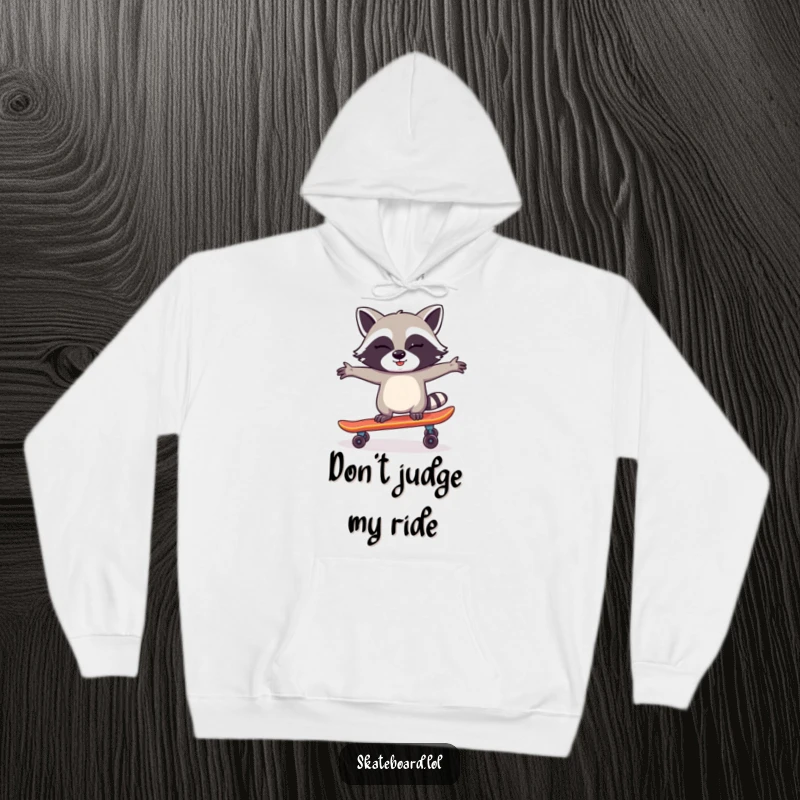 Funny Raccoon Skateboard Hoodie featuring a winking raccoon balancing on a skateboard, offering warmth and hilarious style.